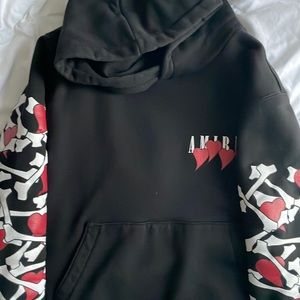 AMIRI
Bones logo print hoodie